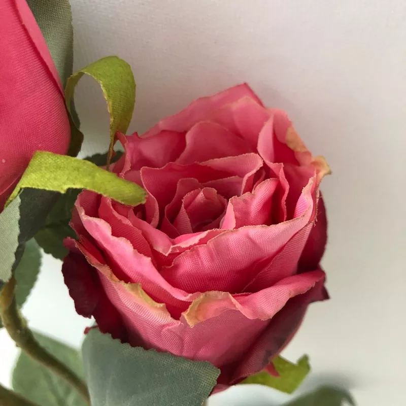red rose artificial flowers set in romantic table arrangement